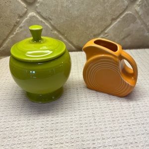New, never used. Fiestaware sugar and creamer in bright, fun colors